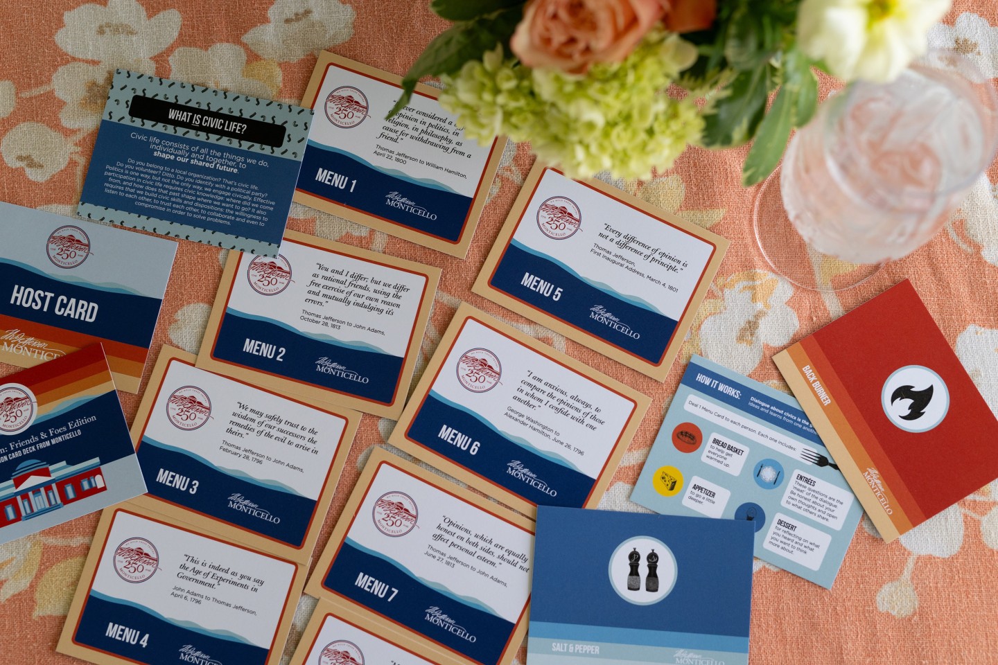 Table laid out with diagonal rows of mostly blue and white cards.